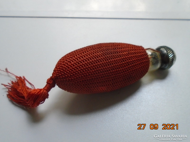 Antique perfume bottle with mesh pump