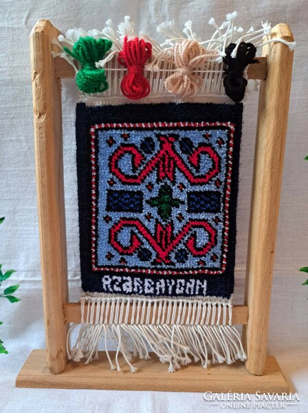 Azerbaijani mini carpet in a souvenir frame