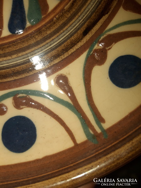 Old, marked, glazed wall plate
