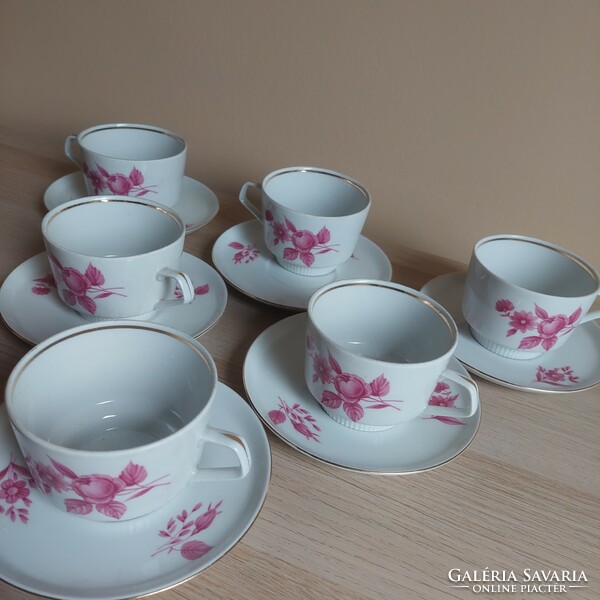A set of coffee cappuccino cups with a floral pattern