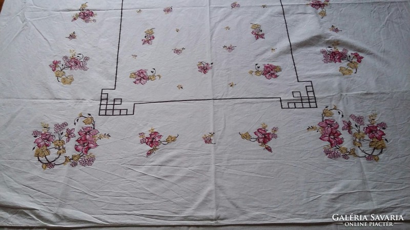 Floral linen tablecloth on a white background