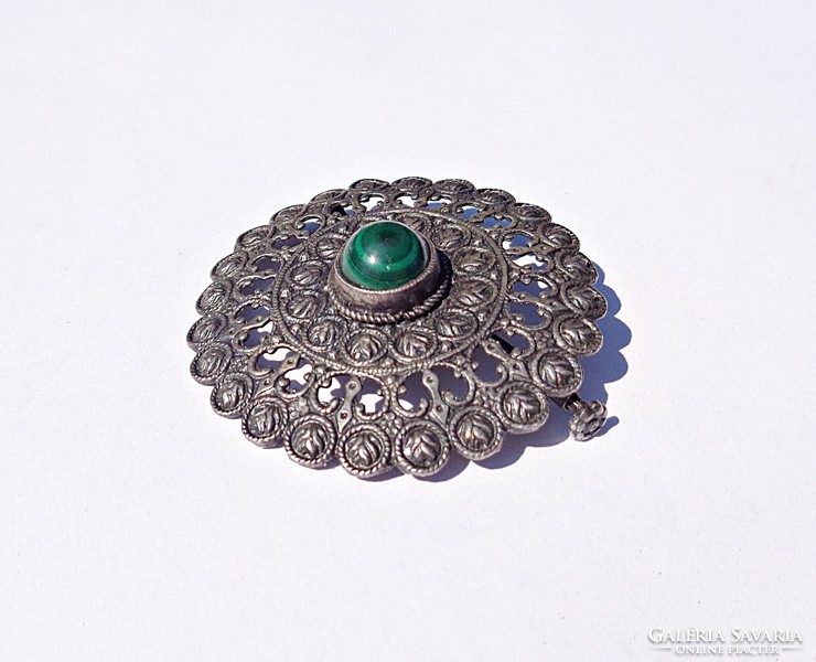 Mint made of openwork pattern malachite stone brooch