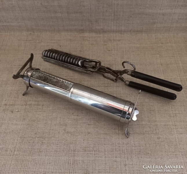 Old marked drgm curling iron with heater marked underneath we-el s quick