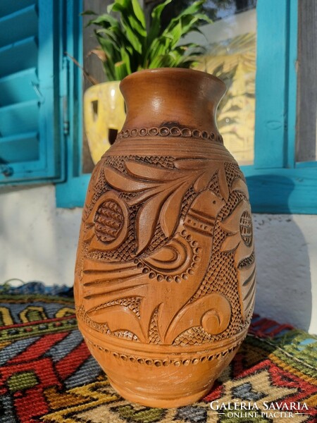 Folk ceramic vase with birds