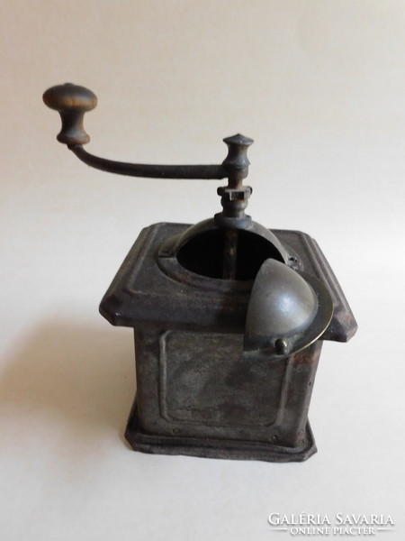 Antique metal coffee grinder