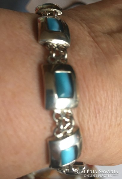 Silver bracelet with opal blue glass stone