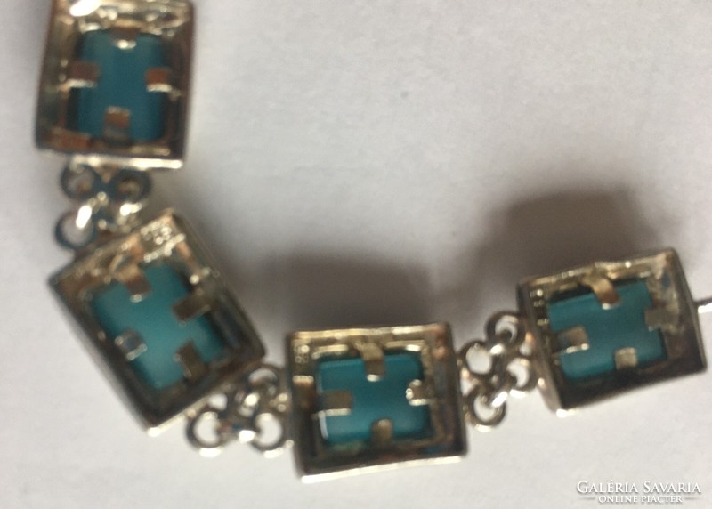 Silver bracelet with opal blue glass stone