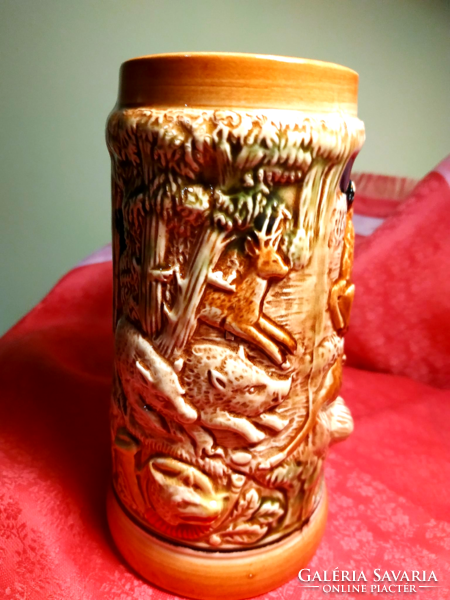 Ceramic jug with wild animal relief for hunters!