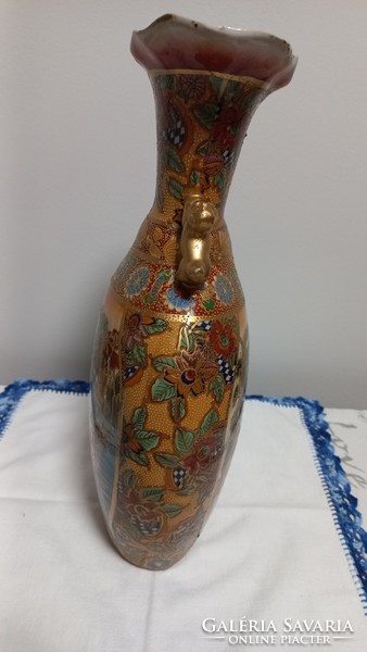 Old xx.No. Porcelain vase made from the second half, depicting an oriental scene, gilded decoration