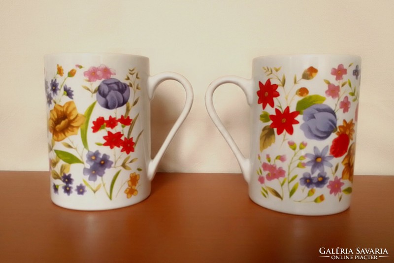 Two colorful, cheerful, atmospheric spring floral floral patterned porcelain tea cocoa mugs, a flawless pair of 2 dl