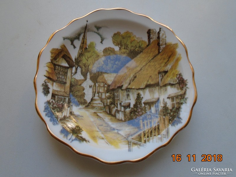 Decorative small plate with a Victorian village picture from the heritage regency series