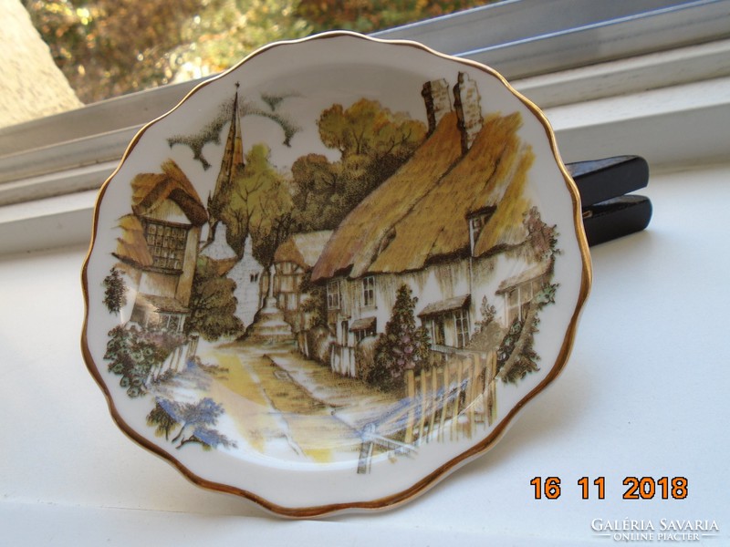 Decorative small plate with a Victorian village picture from the heritage regency series