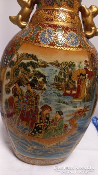 Old xx.No. Porcelain vase made from the second half, depicting an oriental scene, gilded decoration