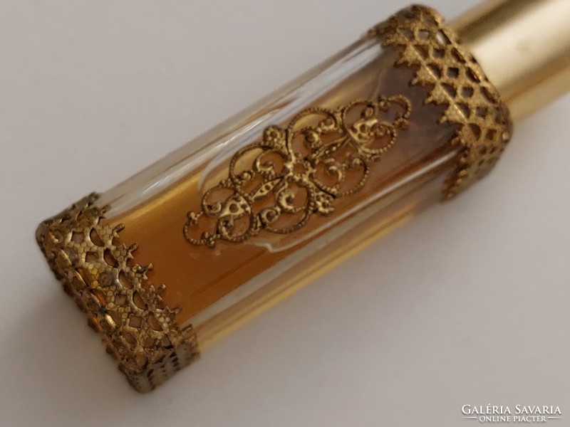 Old perfume bottle in vintage cologne bottle