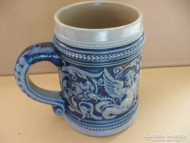 Westerwald beer mug with winged mythological figures