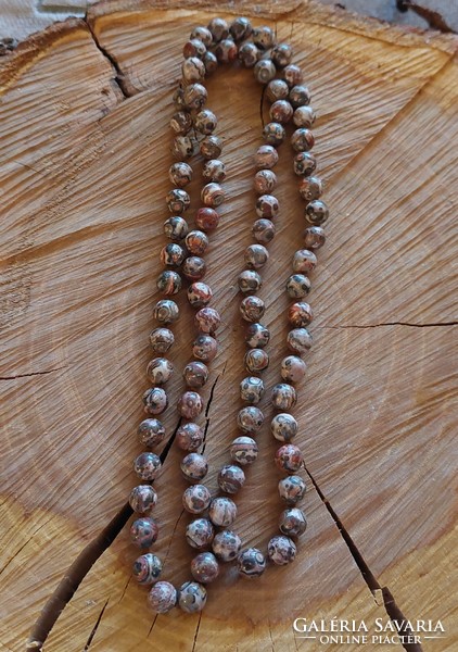 Long leopard jasper necklace with knotted lacing
