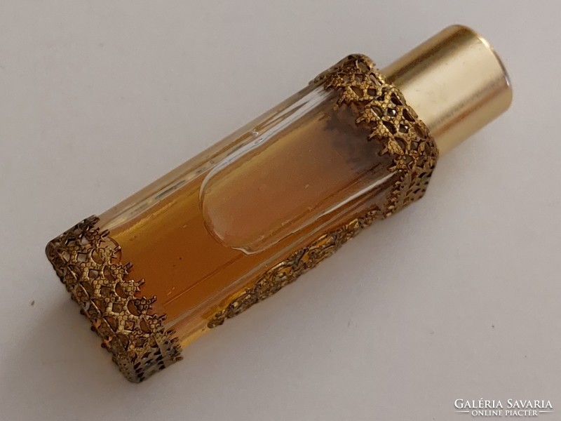 Old perfume bottle in vintage cologne bottle