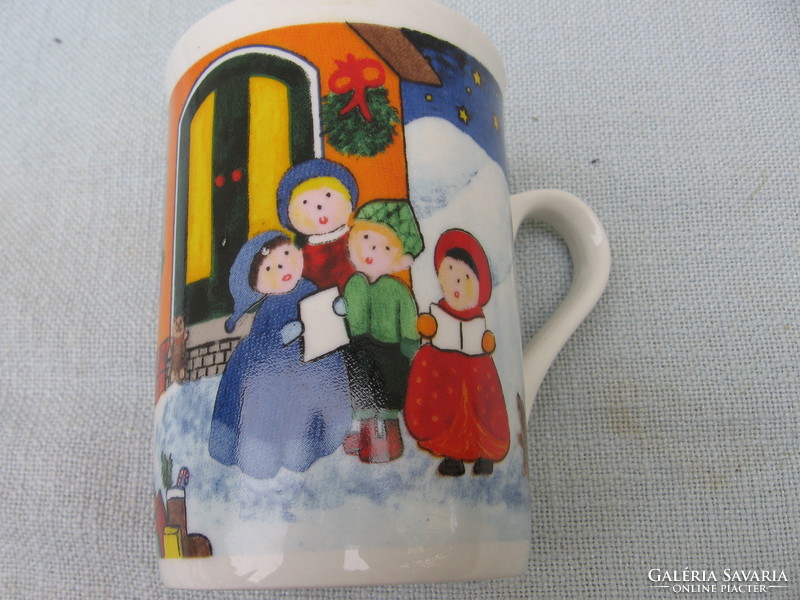 Artistic, collector's mug of children singing to Santa Claus