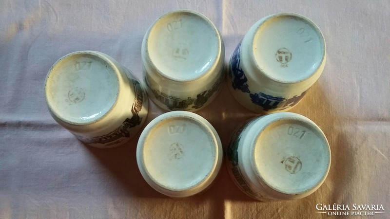Four German (gdr) ceramic glasses with famous Berlin buildings on it