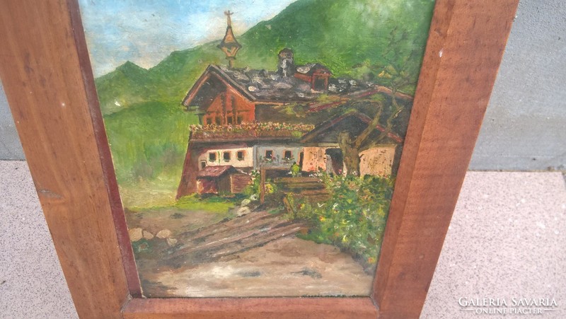 (K) old small landscape painting with a building in an interesting frame.