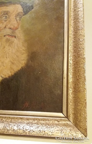 Old painting man portrait in golden frame