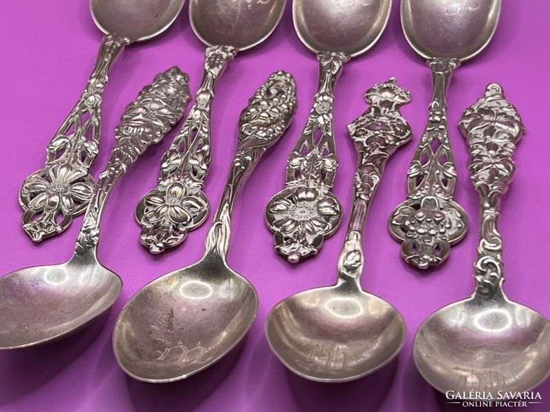 Set of 8 antique marked floral sterling silver spoons