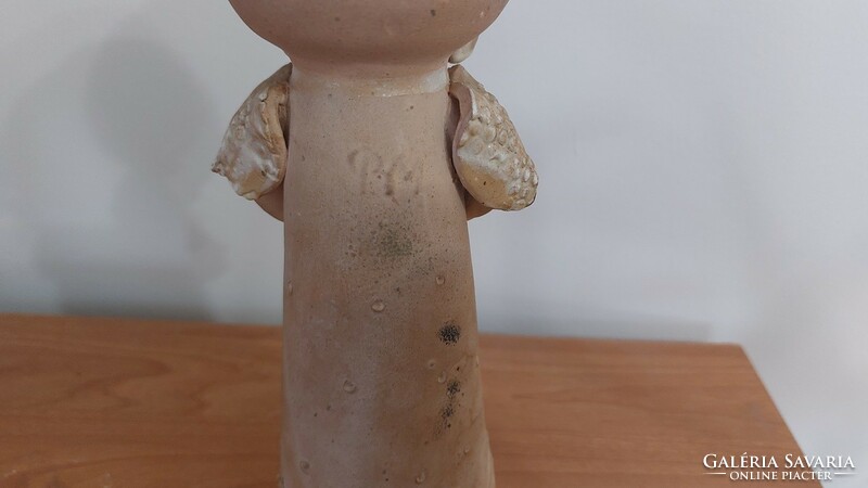 (K) worn and slightly damaged ceramic figure with pm mark, damage photographed. It is about 22 cm high