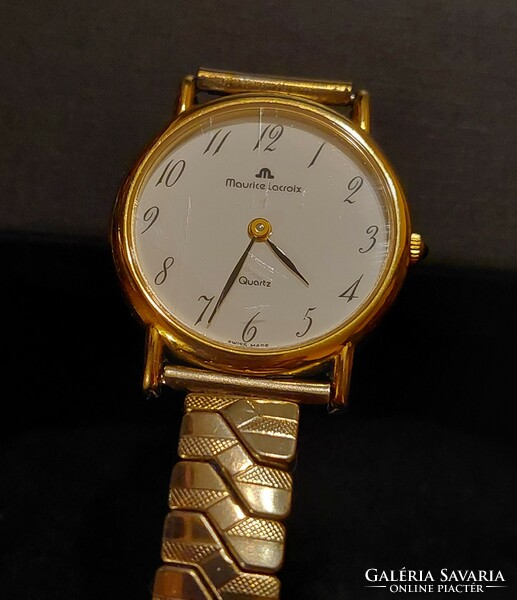 Maurice lacroix wristwatch with flexible metal strap