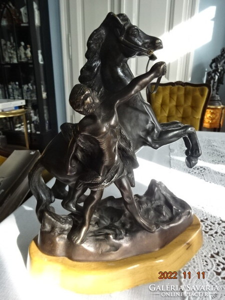 Antique bronze statue of a rider braking his horse, representation of man and animal, weight 7.5 kg. He has!