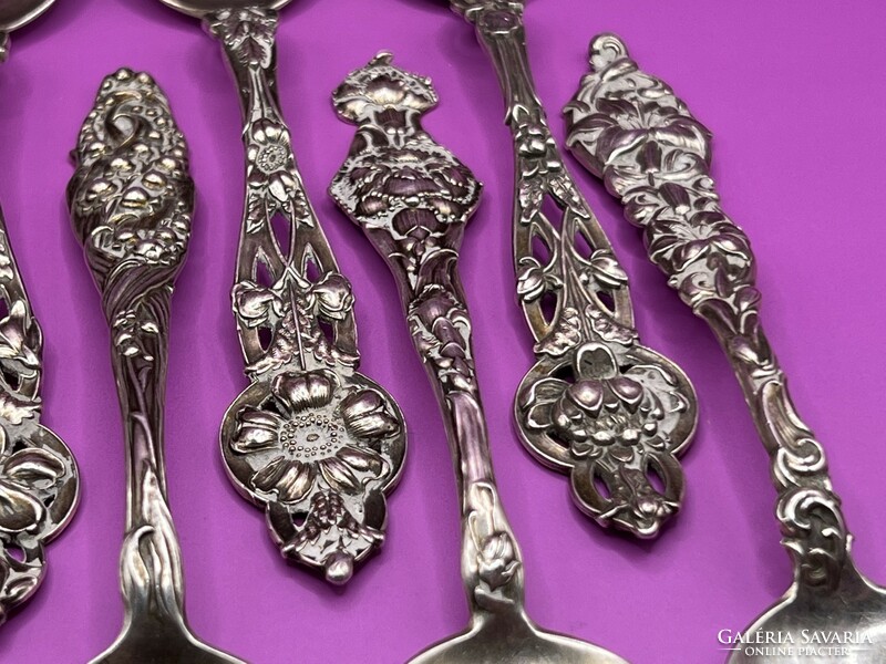Set of 8 antique marked floral sterling silver spoons