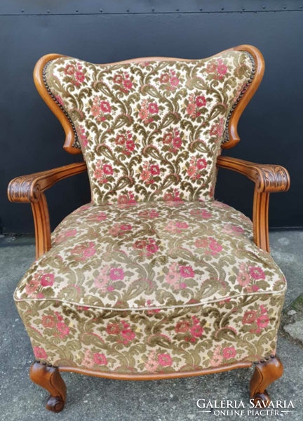 Antique armchair, rare form, special upholstery