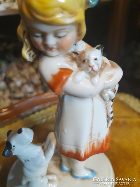 German, Germany Grafenthal, hand-painted porcelain figurine of a little girl petting a dog and cat. 15 Cm.