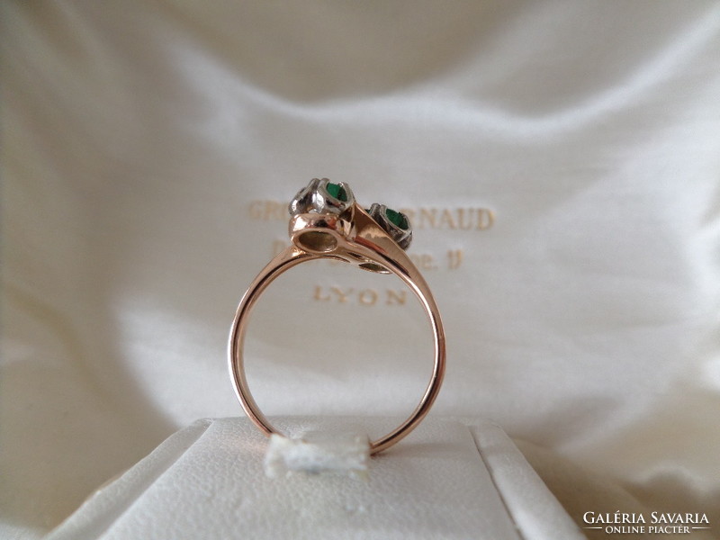 Gold ring with emeralds