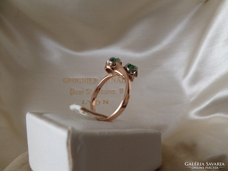 Gold ring with emeralds