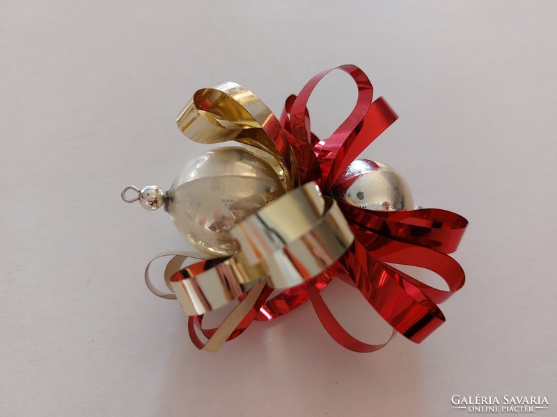 Old glass Christmas tree decoration with retro laminated red silver glass ornament