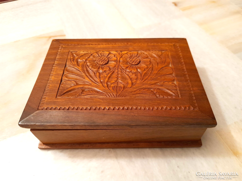 Carved wooden box, cigarette, cigar box decorated with a retro folk motif
