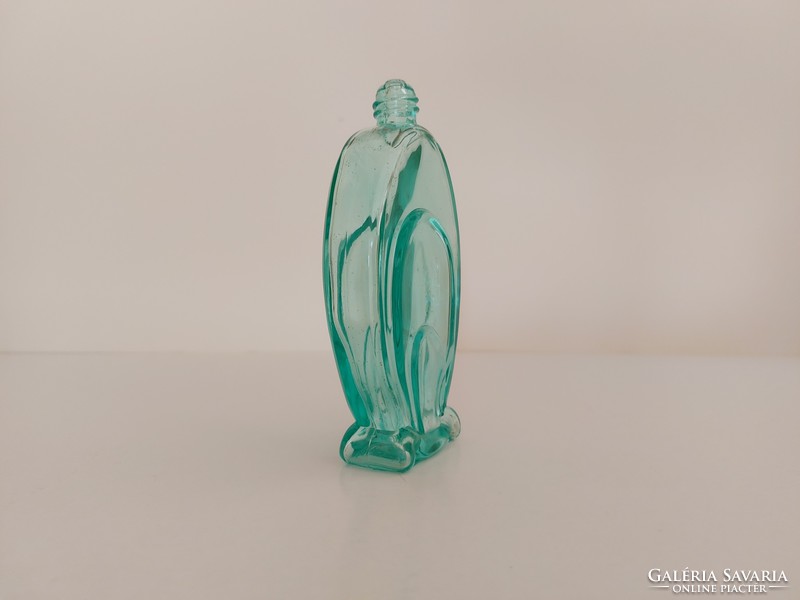 Old art deco perfume bottle in turquoise vintage cologne bottle
