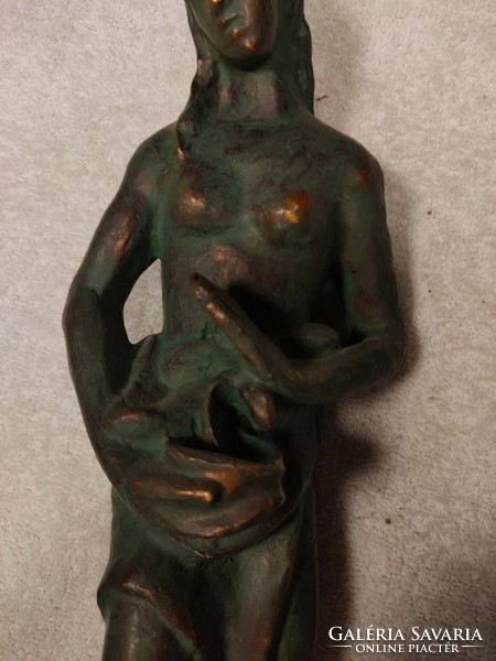 Female statue, marked