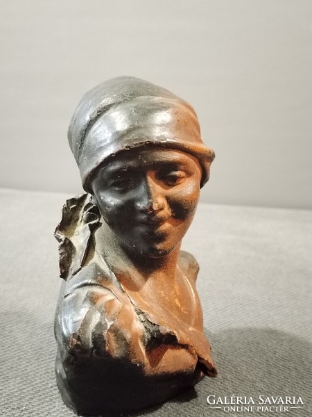 Antique art nouveau tin pourers, a female terracotta portrait in one