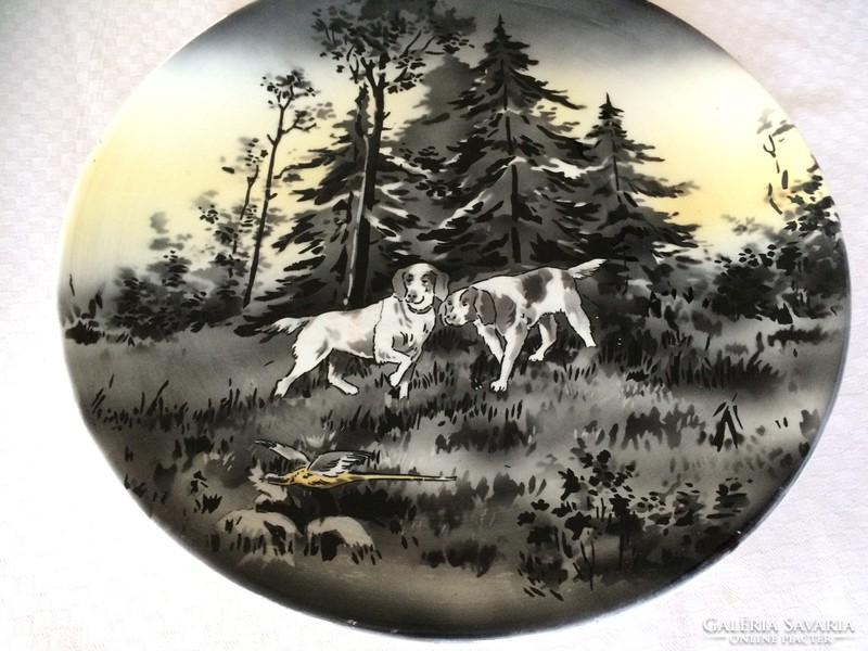 Antique faience decorative plate with a hunting scene