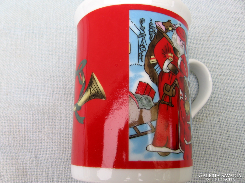 Collector's nostalgia mug, Santa presents the children with a scene