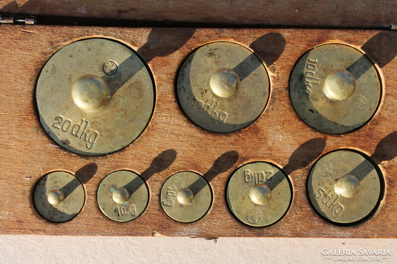 Pharmacy scale copper weights in a wooden box