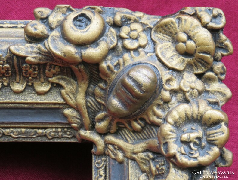 Antique frame, with floral motifs, 53x65 cm.