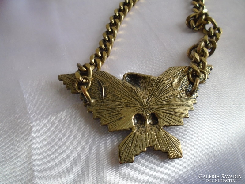 Metal necklace eagle medellin.