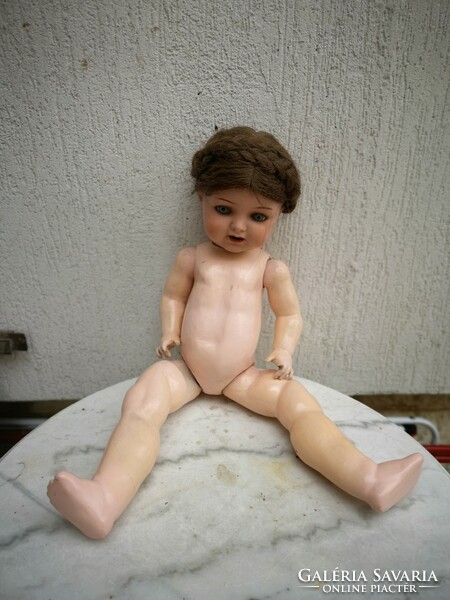 Antique doll, marked (heubach köppelsdorf Germany) has a very nice face and beautiful human hair