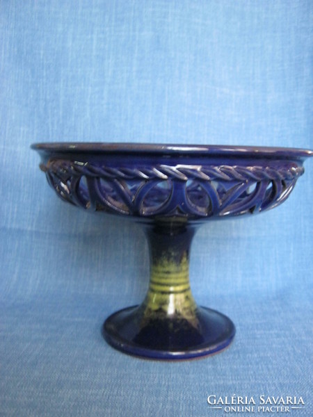 Blue glazed ceramic base plate serving centerpiece with an openwork pattern