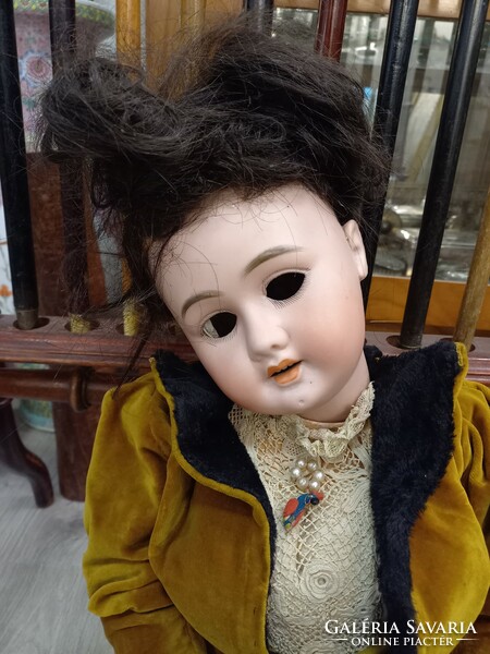 Doll with antique porcelain head