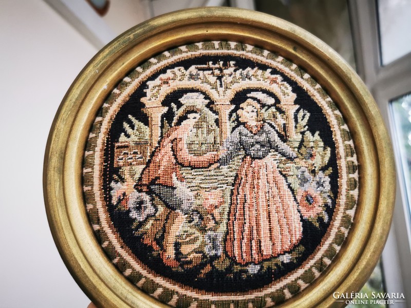 Antique round tapestry