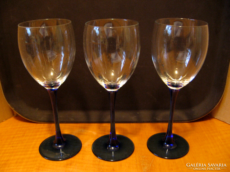 3 wine goblets with cobalt blue stem and base, stemmed glass in one