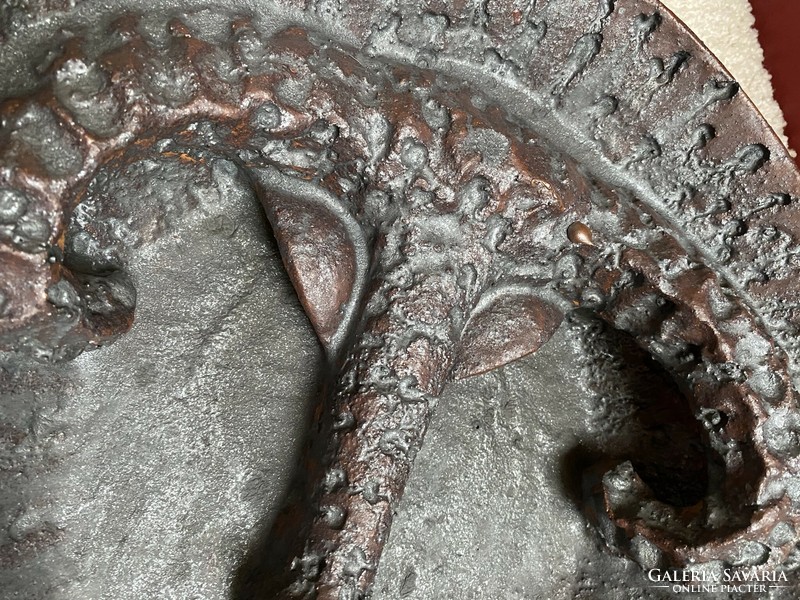 A huge ceramic bowl with a ram's head from '71